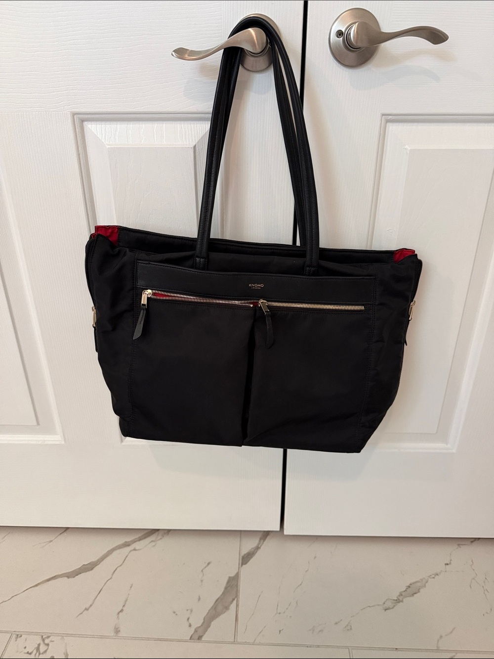 Tumi Black Tote with Red Interior Accents